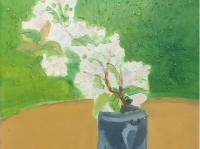 Branche de cerisier dans un pot en étain